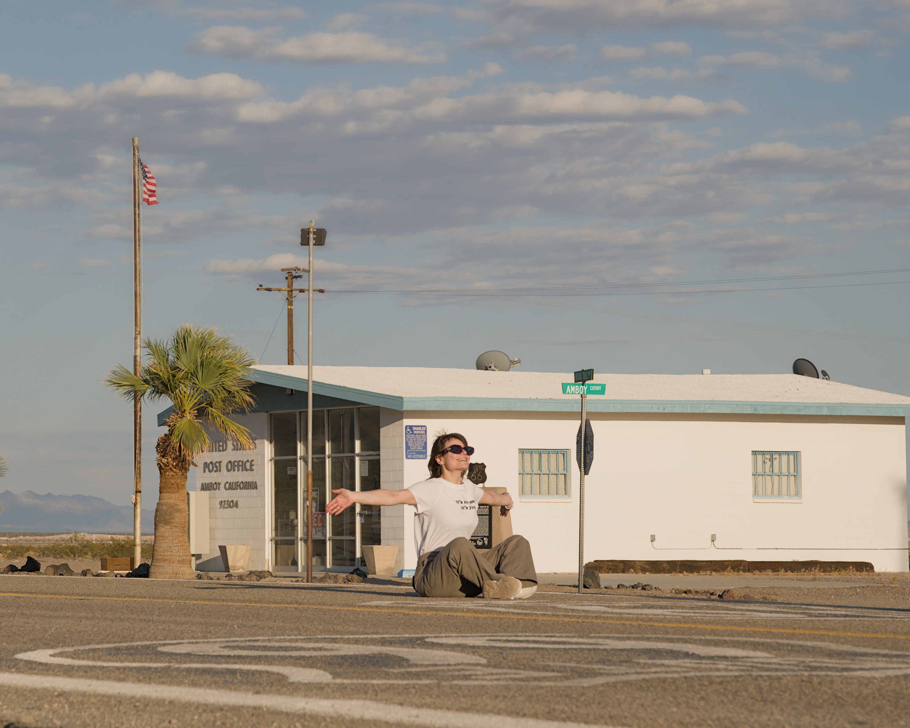 A couple walks into the Route 66 shot at Amboy
